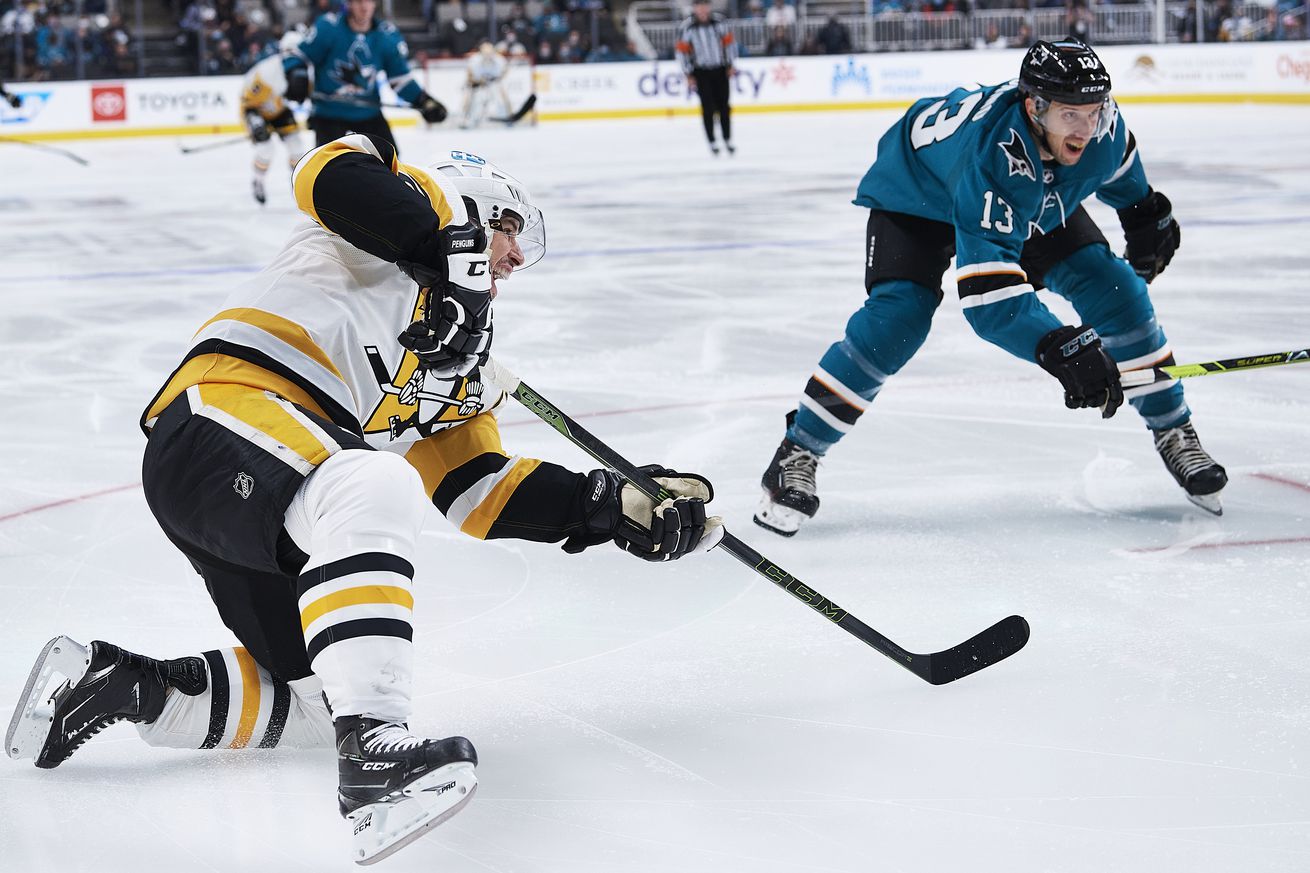 Pittsburgh Penguins center Sidney Crosby (87) takes a shot during the NHL game between the San Jose Sharks and the Pittsburgh Penguins on January 15, 2022 at SAP Center in San Jose, CA.