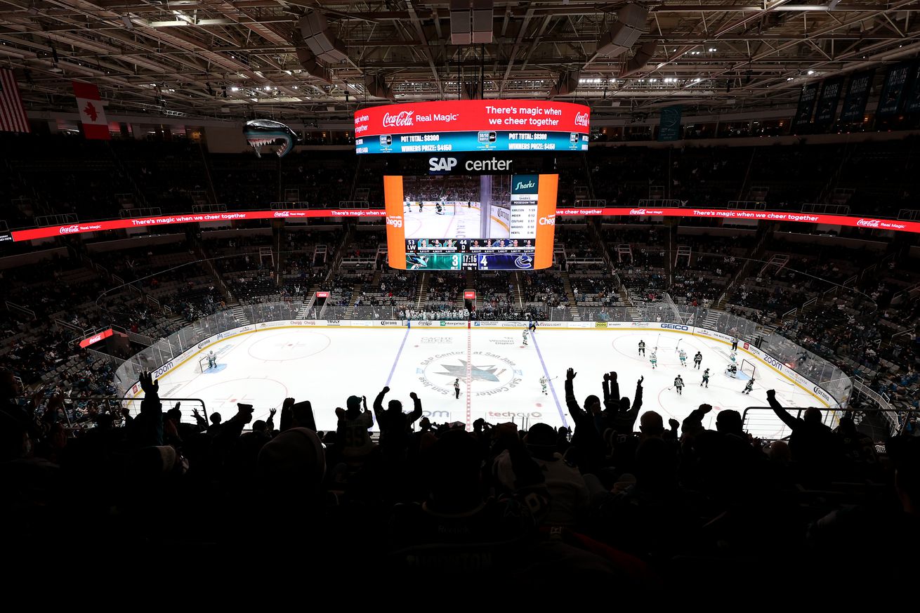 A general view of the fans cheering after the San Jose Sharks scored a goal against the Vancouver Canucks in the third period at SAP Center on December 07, 2022 in San Jose, California.