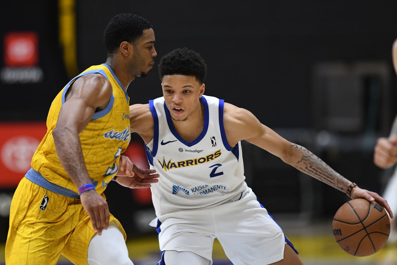 Ryan Rollins dribbling with his left hand in the G League