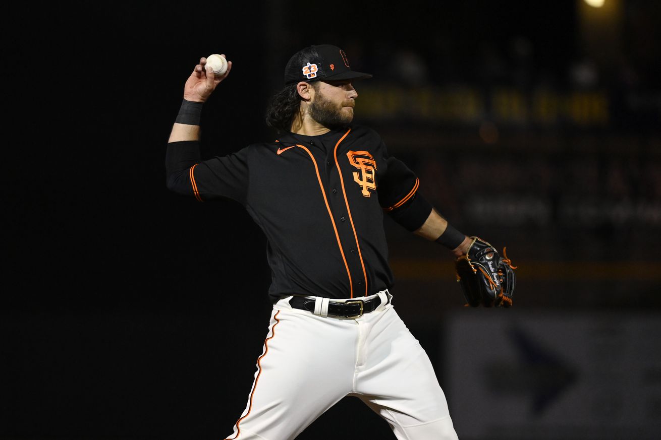 Brandon Crawford throwing a baseball.