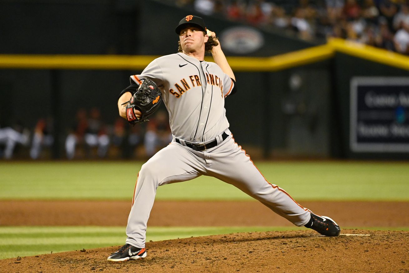 Sam Long throwing a pitch