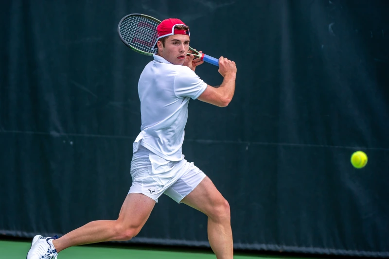 This Week in Sports: A four-peat for men’s gymnastics 2 A man hitting a tennis ball
