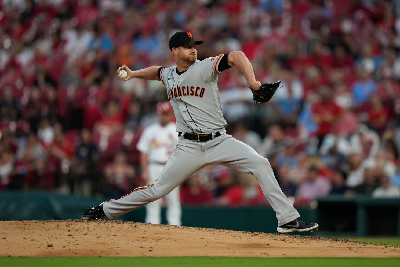 Alex Cobb reaching back to throw a pitch