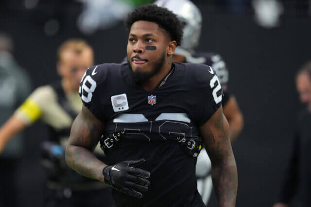 Jan 1, 2023; Paradise, Nevada, USA; Las Vegas Raiders running back Josh Jacobs (28) takes the field before the start of a game against the San Francisco 49ers at Allegiant Stadium. Mandatory Credit: Stephen R. Sylvanie-USA TODAY Sports Josh Jacobs, Raiders