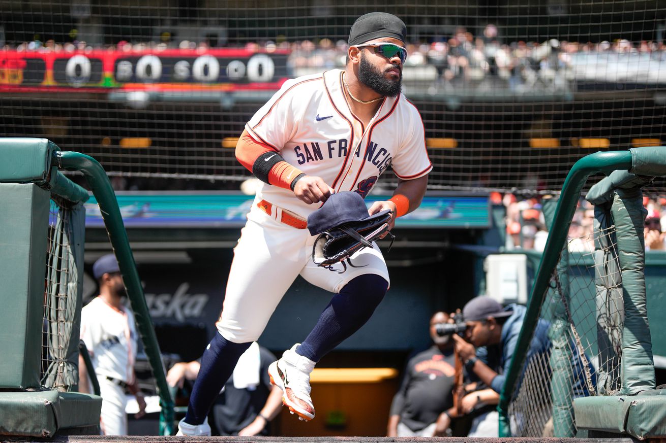 Heliot Ramos running out of the dugout