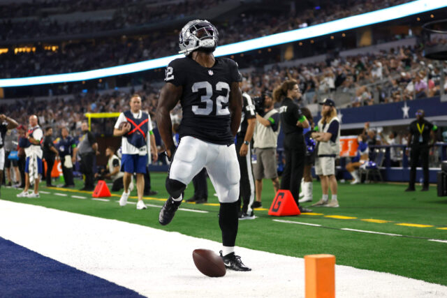 Aug 26, 2023; Arlington, Texas, USA;Las Vegas Raiders running back Damien Williams (32) reacts after scoring a touchdown in the second quarter against the Dallas Cowboys at AT&T Stadium. Mandatory Credit: Tim Heitman-USA TODAY Sports Damien Williams, Raiders