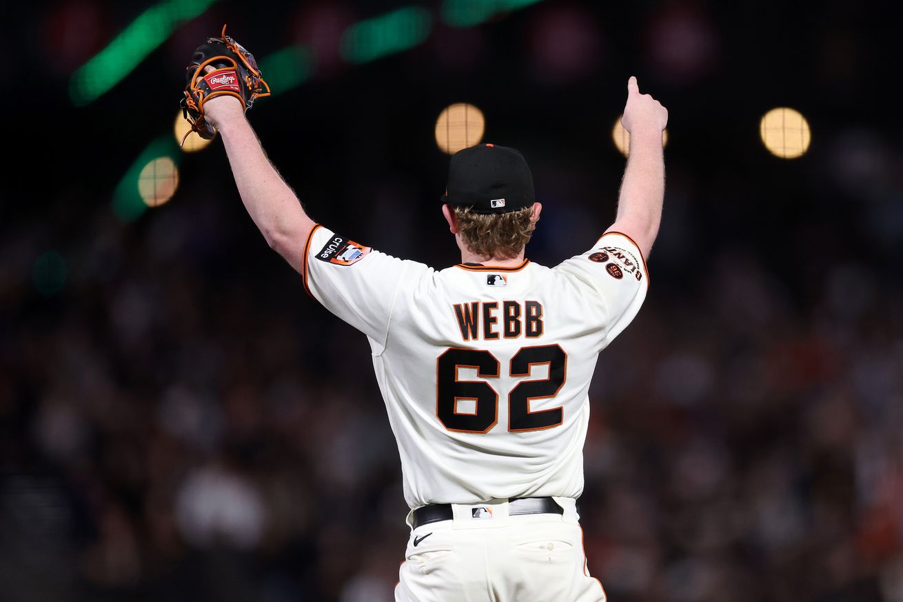 Logan Webb emphatically reaching his arms up