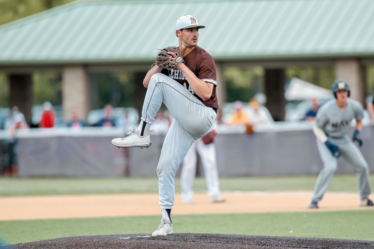 Mason Black with his leg kicked up in his pitching motion while at Lehigh