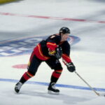 Phil Housley; sweater number 6