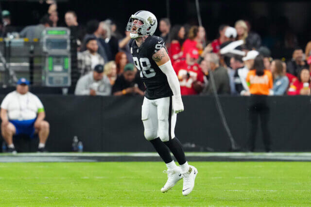 Nov 26, 2023; Paradise, Nevada, USA; Las Vegas Raiders defensive end Maxx Crosby (98) celebrates after sacking Kansas City Chiefs quarterback Patrick Mahomes (15) during the third quarter at Allegiant Stadium. Mandatory Credit: Stephen R. Sylvanie-USA TODAY Sports Maxx Crosby, Raiders