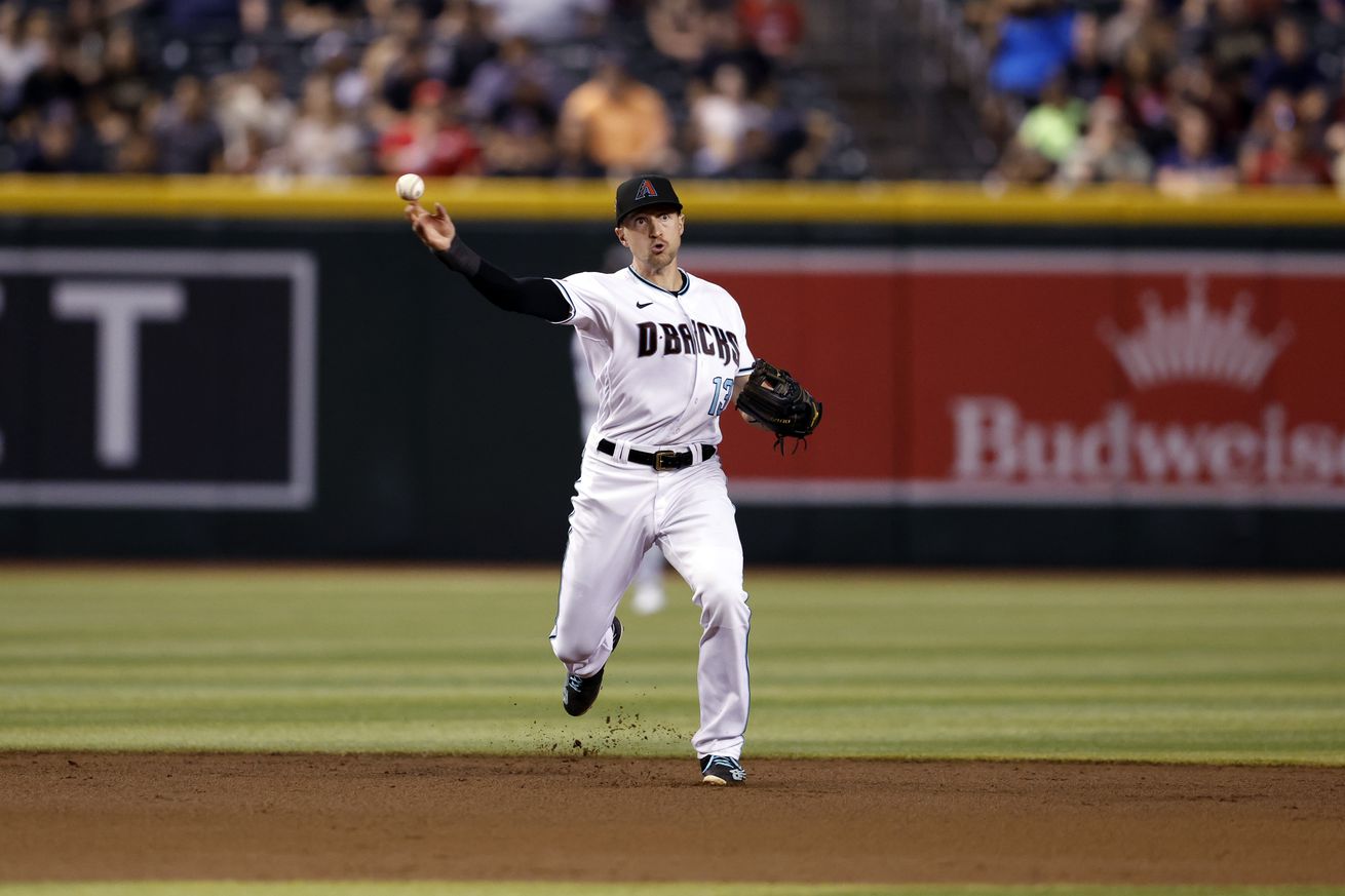 Nick Ahmed making a throw from shortstop.