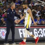 Golden State Warriors head coach Steve Kerr substitutes guard Stephen Curry (30) against the Orlando Magic in the fourth quarter at the Kia Center.