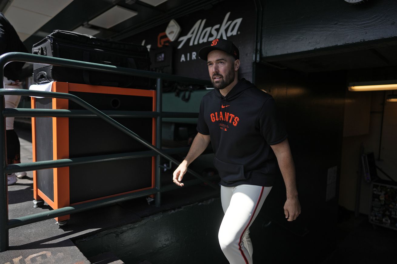 Robbie Ray walking up the dugout steps. 