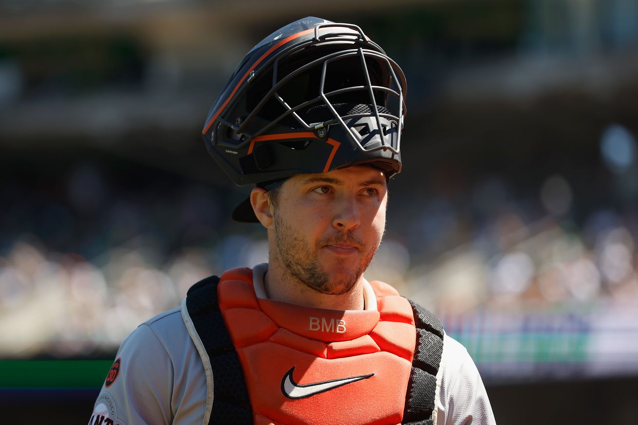 Close up of Patrick Bailey with his catcher’s mask up. 