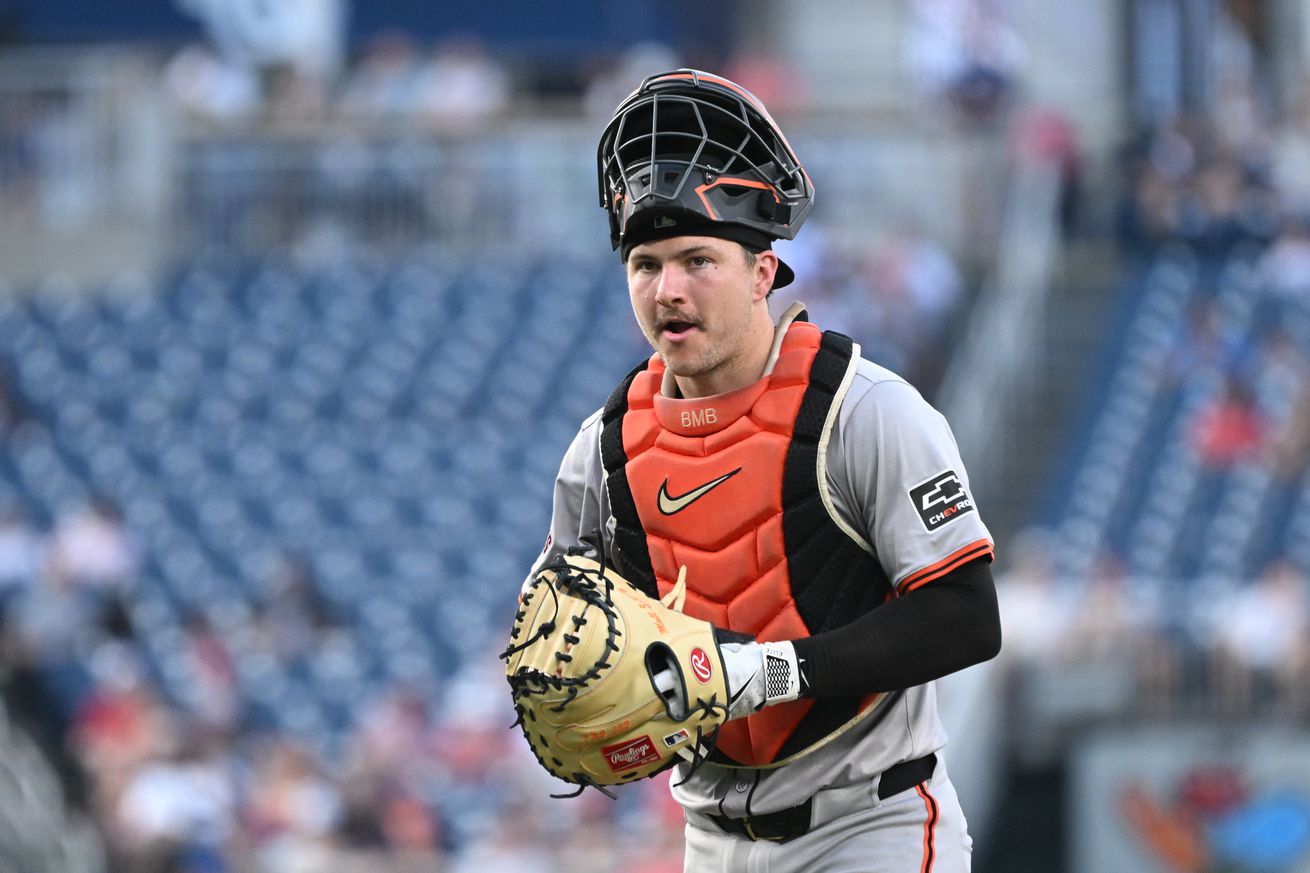 Patrick Bailey with his catcher’s mask flipped up.