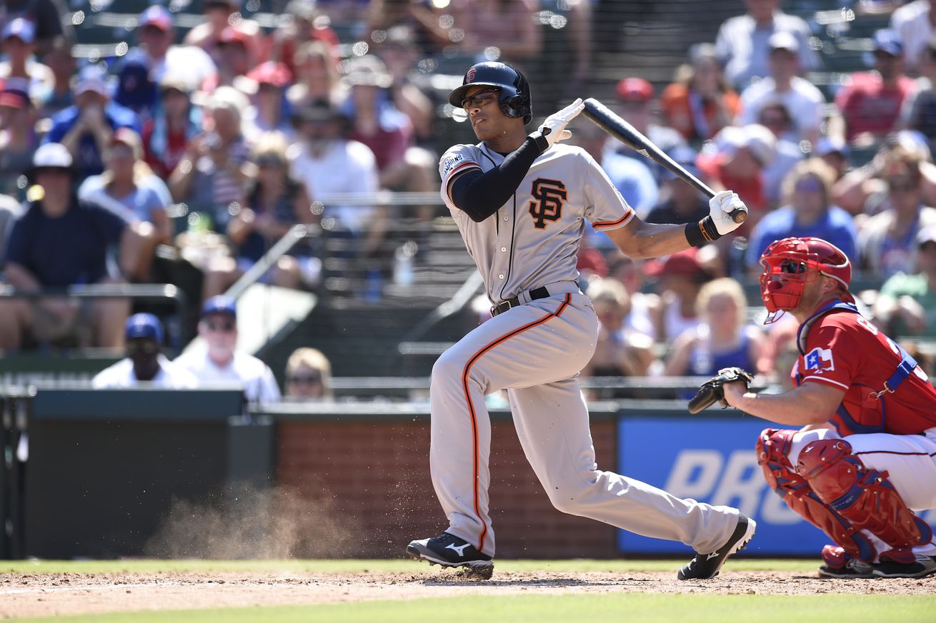 Justin Maxwell swinging the bat.