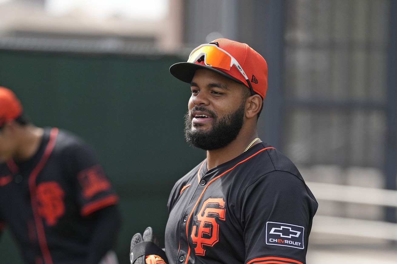 Heliot Ramos smiling and laughing at Spring Training.