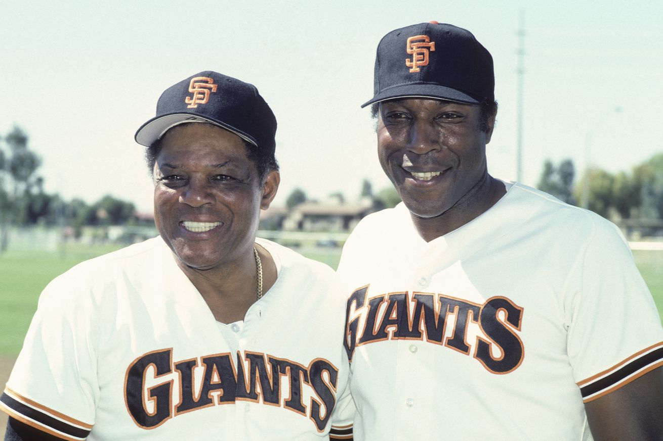 Willie McCovey posing with Willie Mays at Spring Training in the 1980s.
