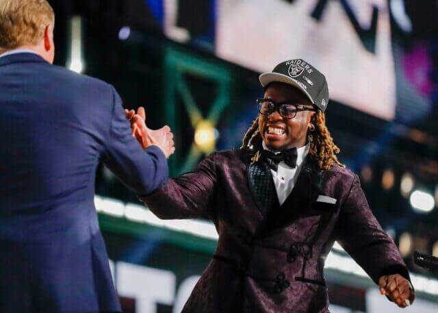 Running back Ashton Jeanty slaps hands with NFL Commissioner Roger Goodell after being selected sixth overall by the Las Vegas Raiders during the first round of the 2025 NFL Draft on Thursday, April 24, 2025, at Lambeau Field in Green Bay, Wisconsin. The draft runs through April 26.
Tork Mason/USA TODAY NETWORK-Wisconsin Ashton Jeanty, Raiders, NFL Draft