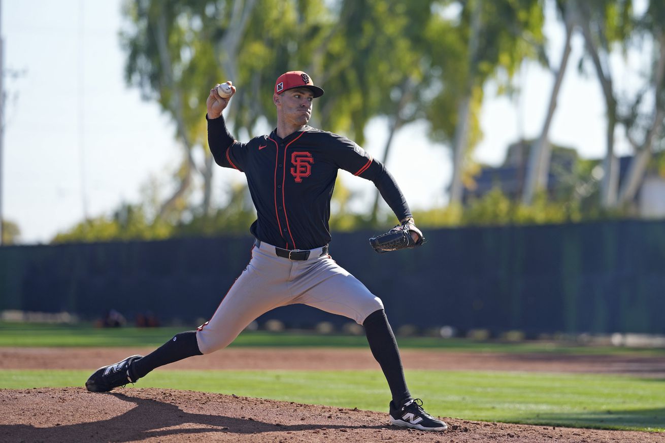 Carson Ragsdale throwing a pitch on a practice field.