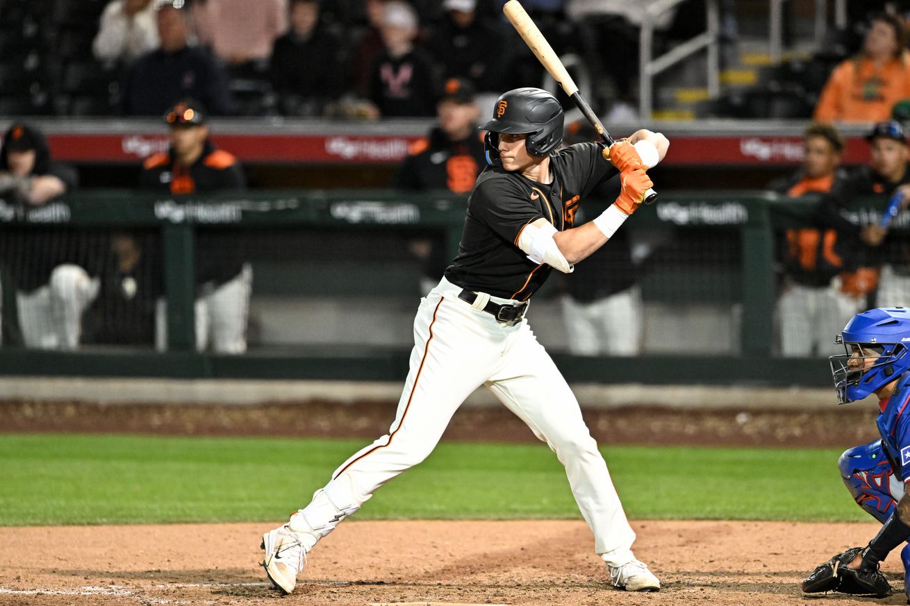 Walker Martin in the batter’s box in a Giants jersey.