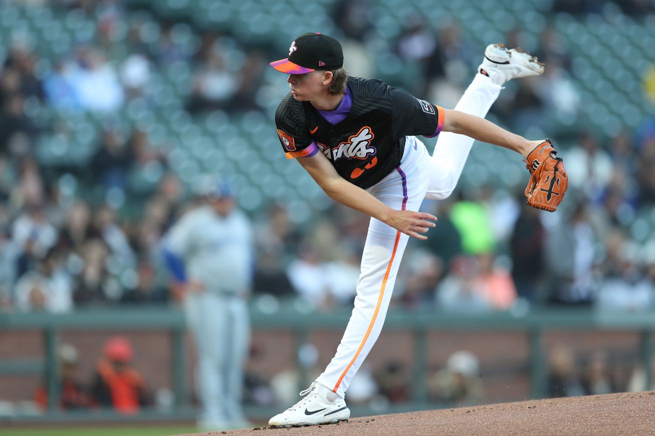 Hayden Birdsong kicking his leg after a pitch.
