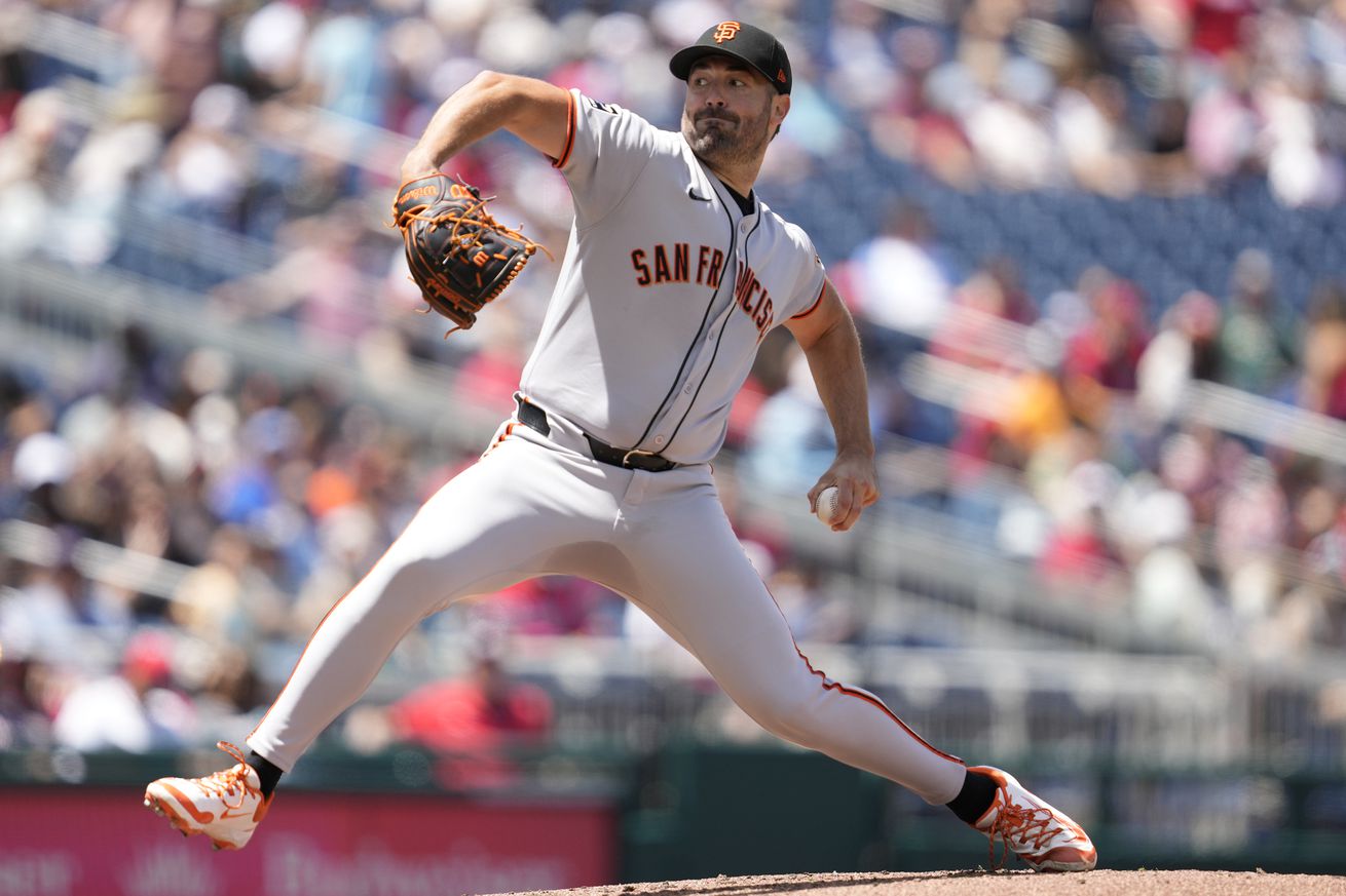 Robbie Ray reaching back to throw a pitch.