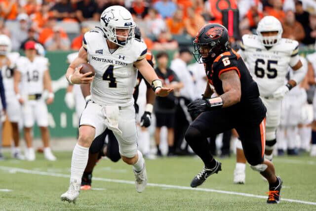 Sep 17, 2022; Portland, Oregon, USA; Montana State Bobcats quarterback Tommy Mellott (4) scrambles under pressure from Oregon State Beavers linebacker John McCartan (6) during the first half at Providence Park. Mandatory Credit: Soobum Im-USA TODAY Sports Tommy Mellott, Raiders
