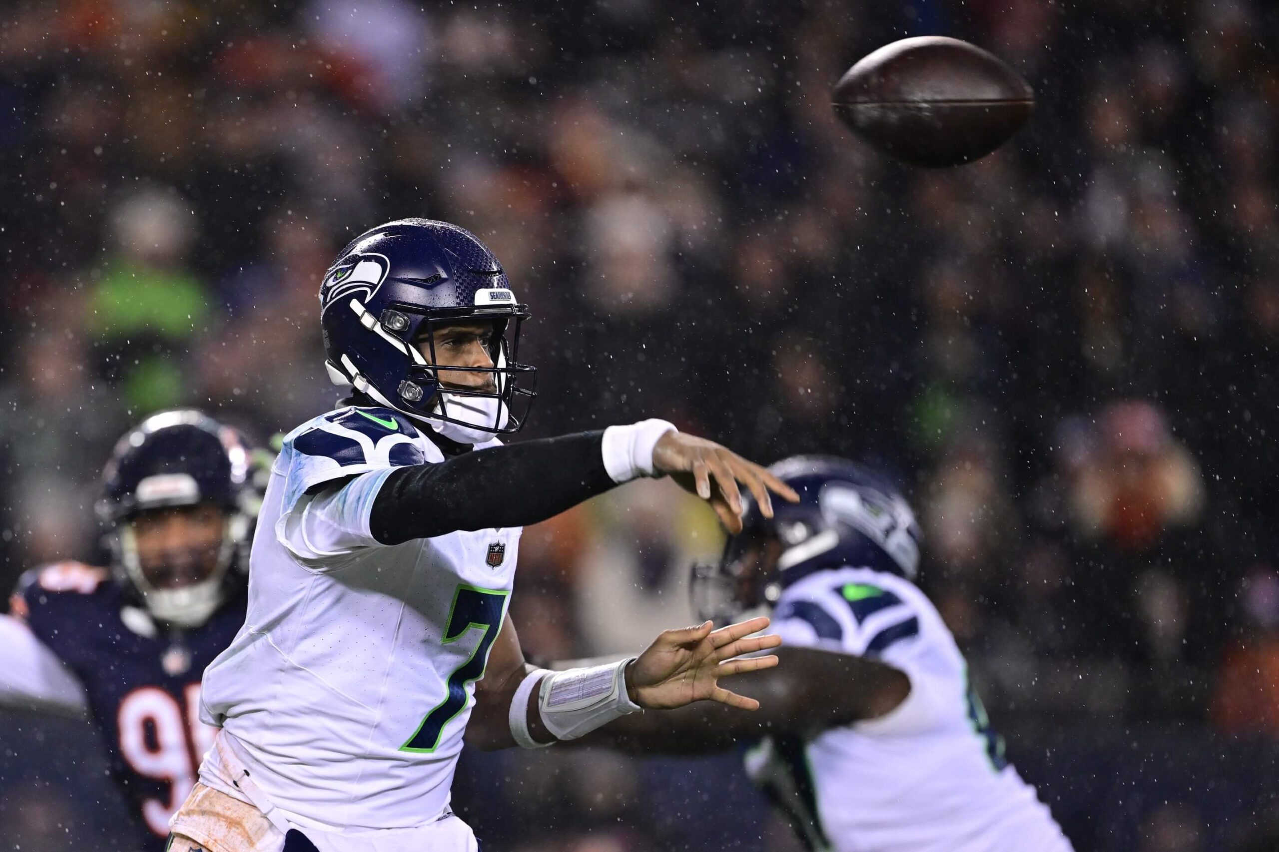 Dec 26, 2024; Chicago, Illinois, USA; Seattle Seahawks quarterback Geno Smith (7) passes the ball against the Chicago Bears during the third quarter at Soldier Field. Mandatory Credit: Daniel Bartel-Imagn Images