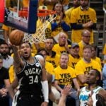 Apr 29, 2025; Indianapolis, Indiana, USA; Milwaukee Bucks forward Giannis Antetokounmpo (34) shoots the ball while Indiana Pacers guard Andrew Nembhard (2) defends during game five of the first round for the 2024 NBA Playoffs at Gainbridge Fieldhouse. Mandatory Credit: Trevor Ruszkowski-Imagn Images
