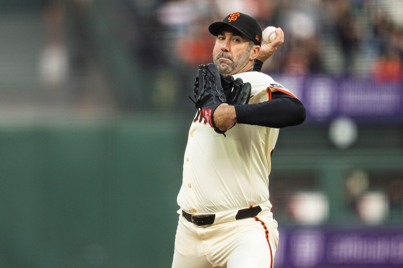 Close up view from the catcher’s perspective of Justin Verlander throwing a pitch.