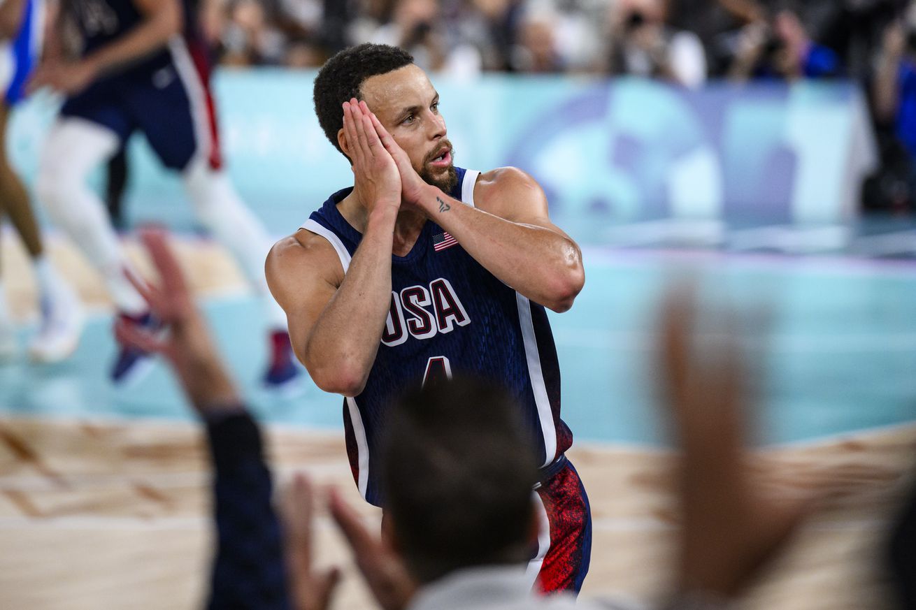 PARIS, FRANCE - AUGUST 10: Stephen Curry of Team United States hits the night-night celly during the Men’s Gold Medal game between Team France and Team United States on day fifteen of the Olympic Games Paris 2024 at the Bercy Arena on August 10, 2024 in Paris, France.