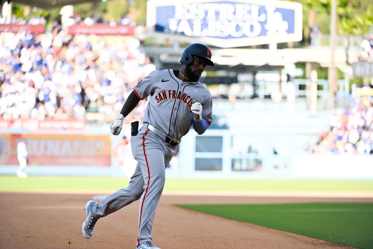 Daniel Johnson running the bases after a home run.