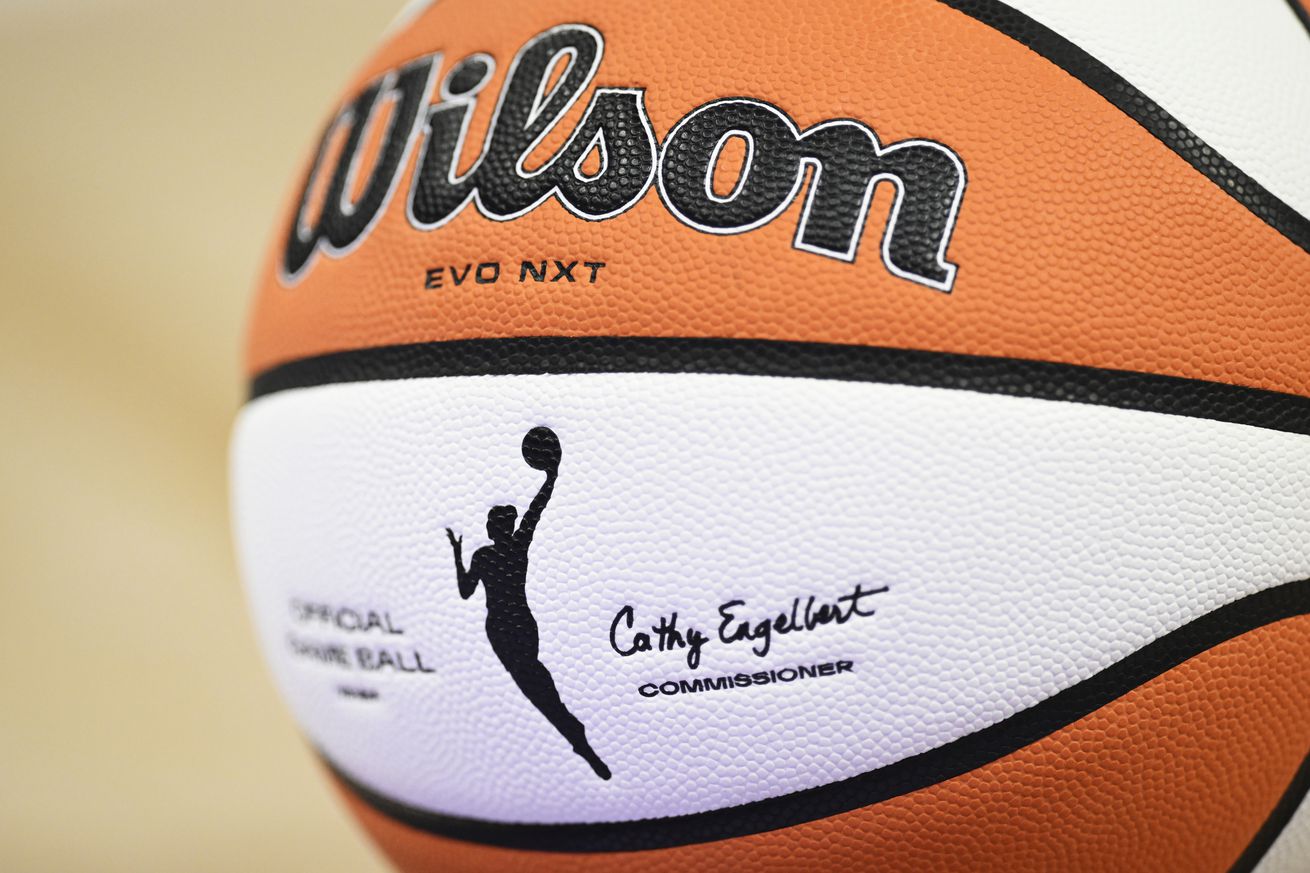 SAN FRANCISCO, CALIFORNIA - JUNE 19: The WNBA and Wilson logos are seen on a basketball during a time out between the Golden State Valkyries and Indiana Fever in the third quarter at Chase Center on June 19, 2025 in San Francisco, California. Close-up of a WNBA ball.