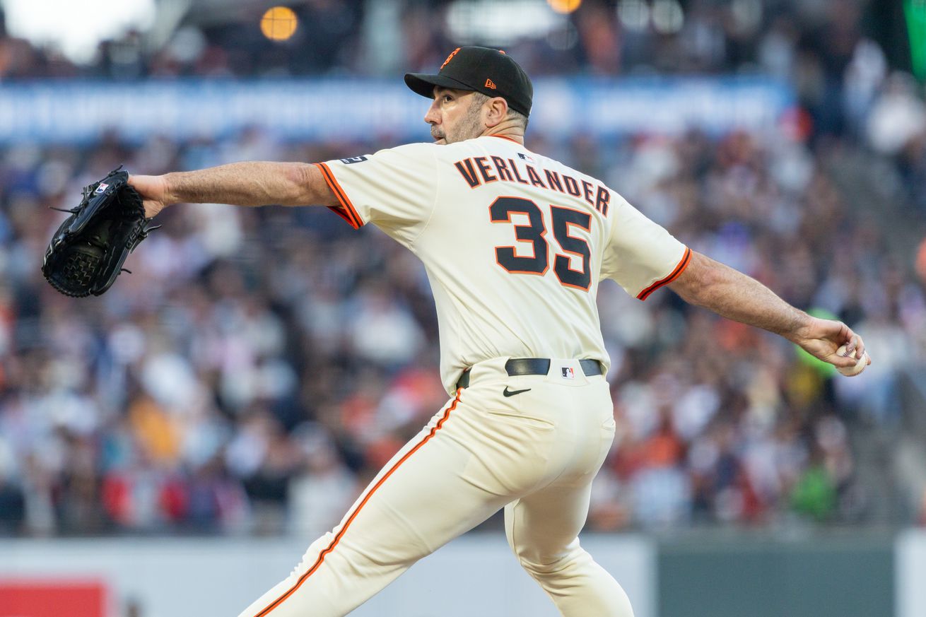 View from behind of Justin Verlander throwing a pitch