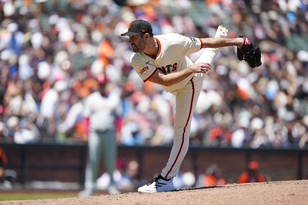 Side view of Justin Verlander throwing a pitch. 
