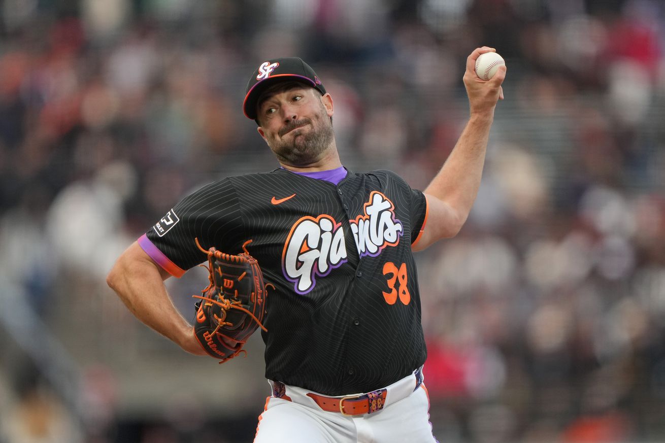 Robbie Ray throwing a pitch.