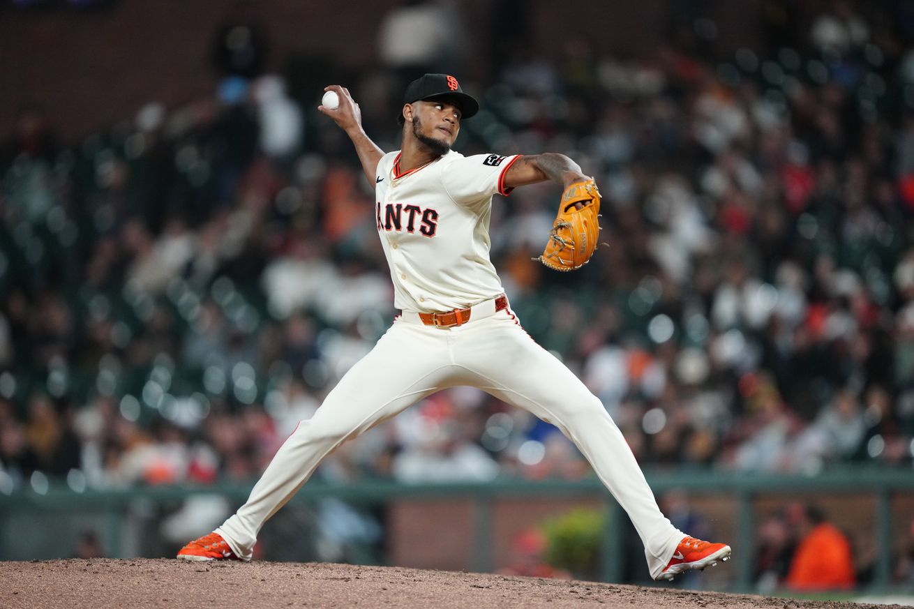 Camilo Doval throwing a pitch.
