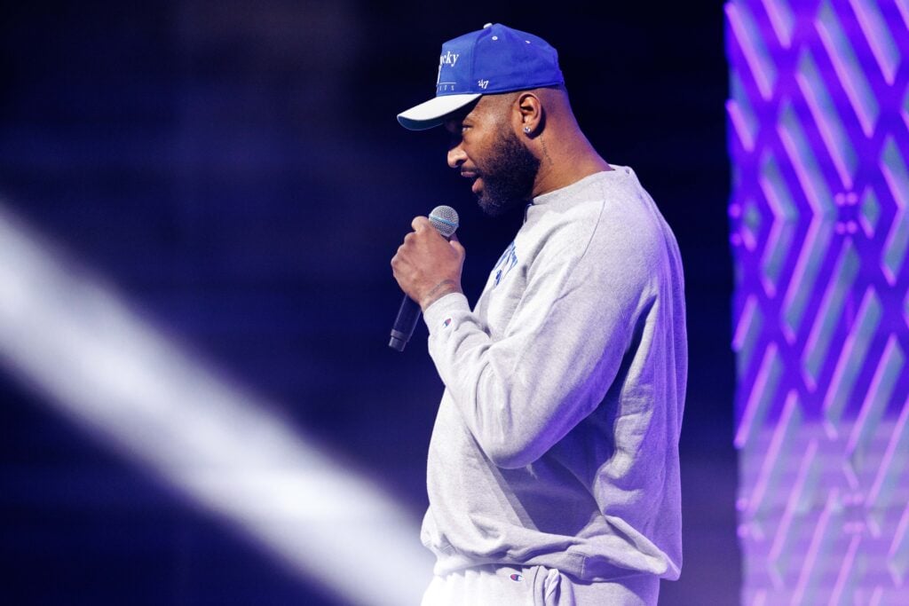 Oct 13, 2023; Lexington, KY, USA; Previous Kentucky Wildcat and NBA player DeMarcus Cousins introduces head coach John Calipari during Big Blue Madness at Rupp Arena at Central Bank Center. Mandatory Credit: Jordan Prather-USA TODAY Sports