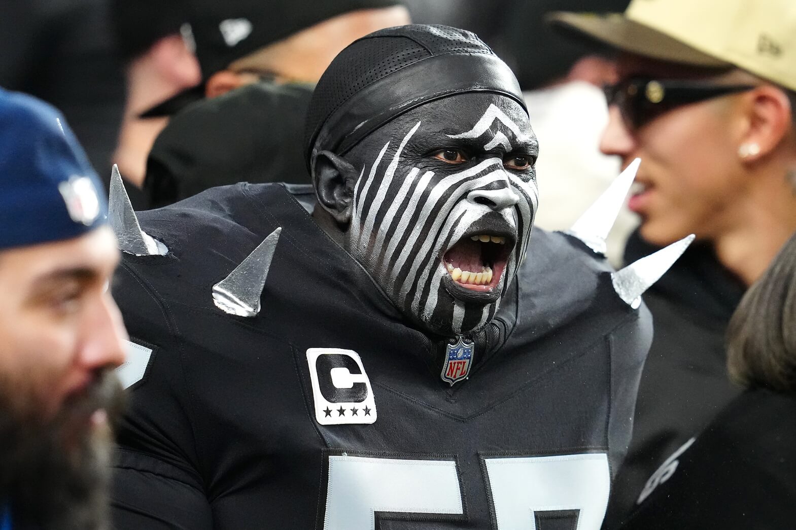 Jan 5, 2025; Paradise, Nevada, USA; A Las Vegas Raiders fan shouts during a play between the Raiders and the Los Angeles Chargers during the fourth quarter at Allegiant Stadium. Mandatory Credit: Stephen R. Sylvanie-Imagn Images Passionate Raiders Fan