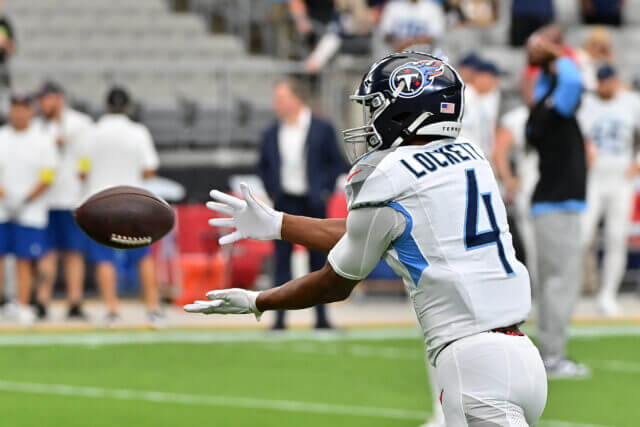 Oct 5, 2025; Glendale, Arizona, USA; Tennessee Titans wide receiver Tyler Lockett (4) warms up before their game against the Arizona Cardinals at State Farm Stadium. Mandatory Credit: Matt Kartozian-Imagn Images Tyler Lockett, Titans, Raiders