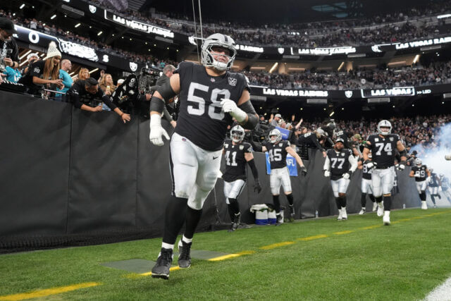 Dec 22, 2024; Paradise, Nevada, USA; Las Vegas Raiders guard Jackson Powers-Johnson (58) enters the field before the game against the Jacksonville Jaguars at Allegiant Stadium. Mandatory Credit: Kirby Lee-Imagn Images Jackson Powers-Johnson, Raiders