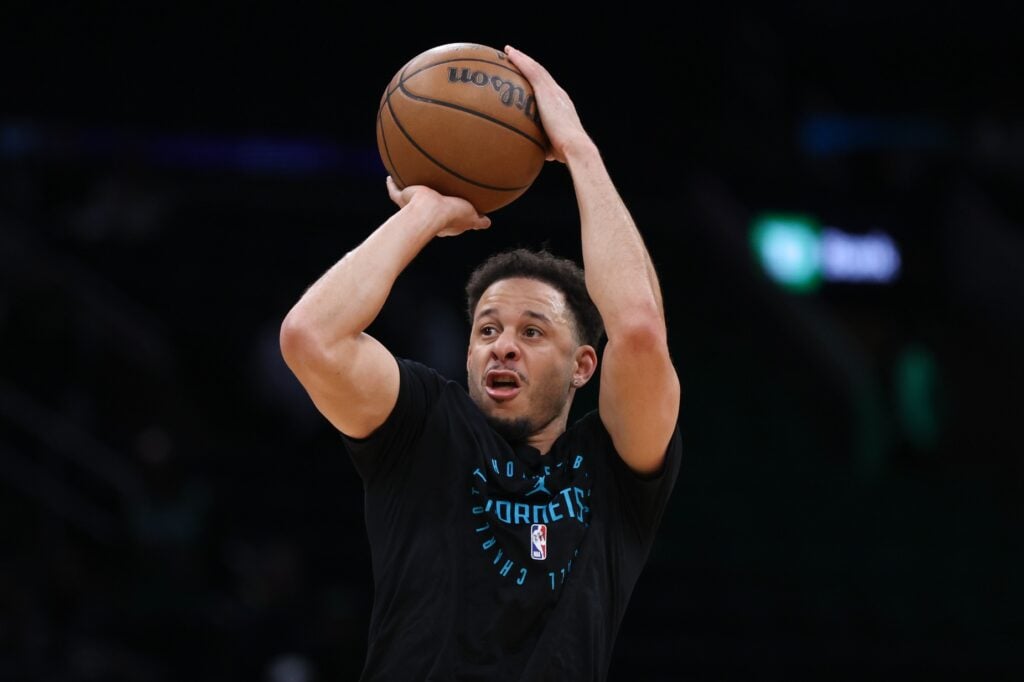 Apr 13, 2025; Boston, Massachusetts, USA; Charlotte Hornets guard Seth Curry (30) shoots during warm ups before a game against the Boston Celtics at TD Garden. Mandatory Credit: Paul Rutherford-Imagn Images