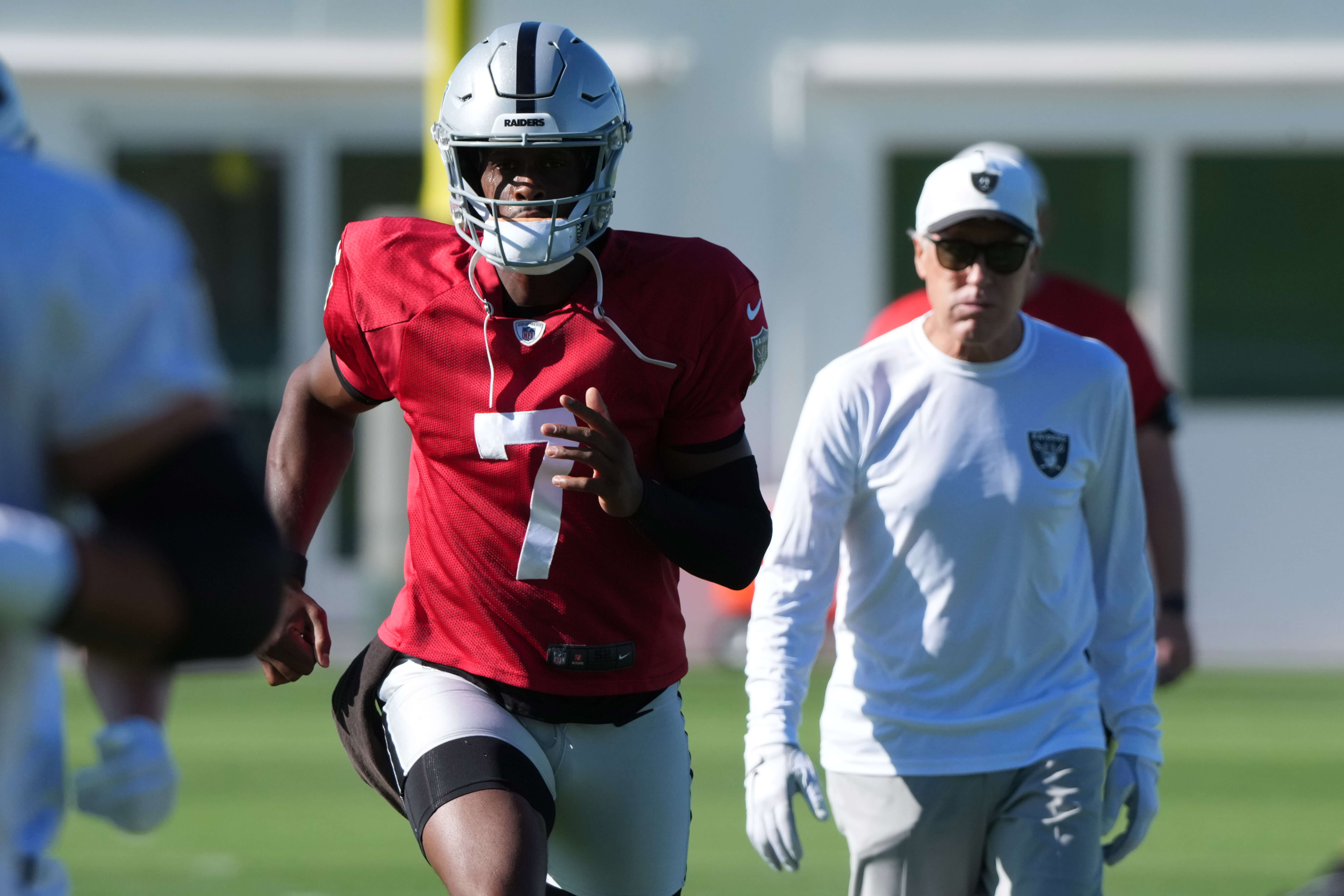 Jul 24, 2025; Henderson, NV, USA; Las Vegas Raiders quarterback Geno Smith (7) with coach Pete Carroll during training camp at the Intermountain Healthcare Performance Center. Mandatory Credit: Kirby Lee-Imagn Images Geno Smith, Pete Carroll, Raiders