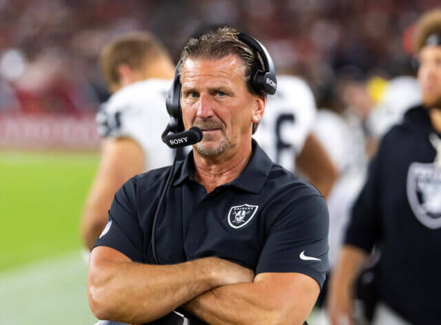 Aug 23, 2025; Glendale, Arizona, USA; Las Vegas Raiders quarterbacks coach Greg Olson against the Arizona Cardinals during a preseason NFL game at State Farm Stadium. Mandatory Credit: Mark J. Rebilas-Imagn Images Greg Olson, Raiders